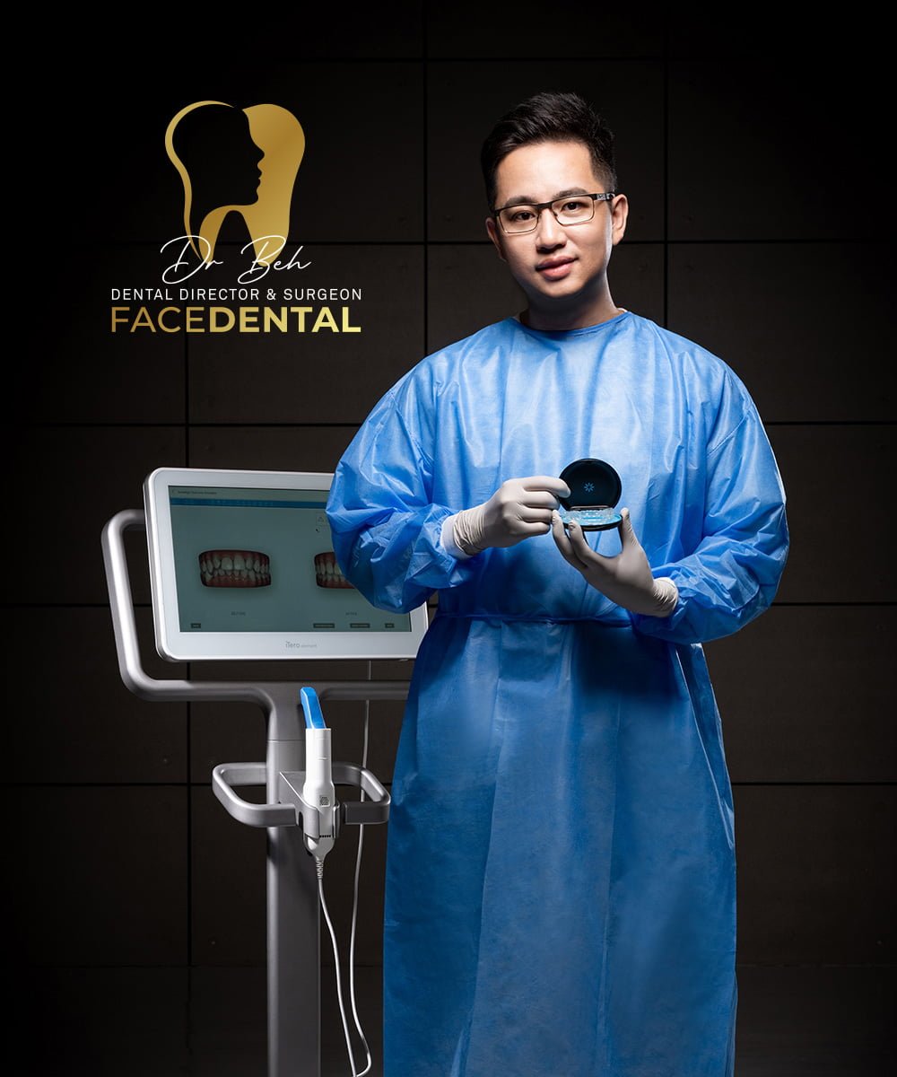 Doctor standing and holding an Invisalign case with an iTero Element 2 scanner