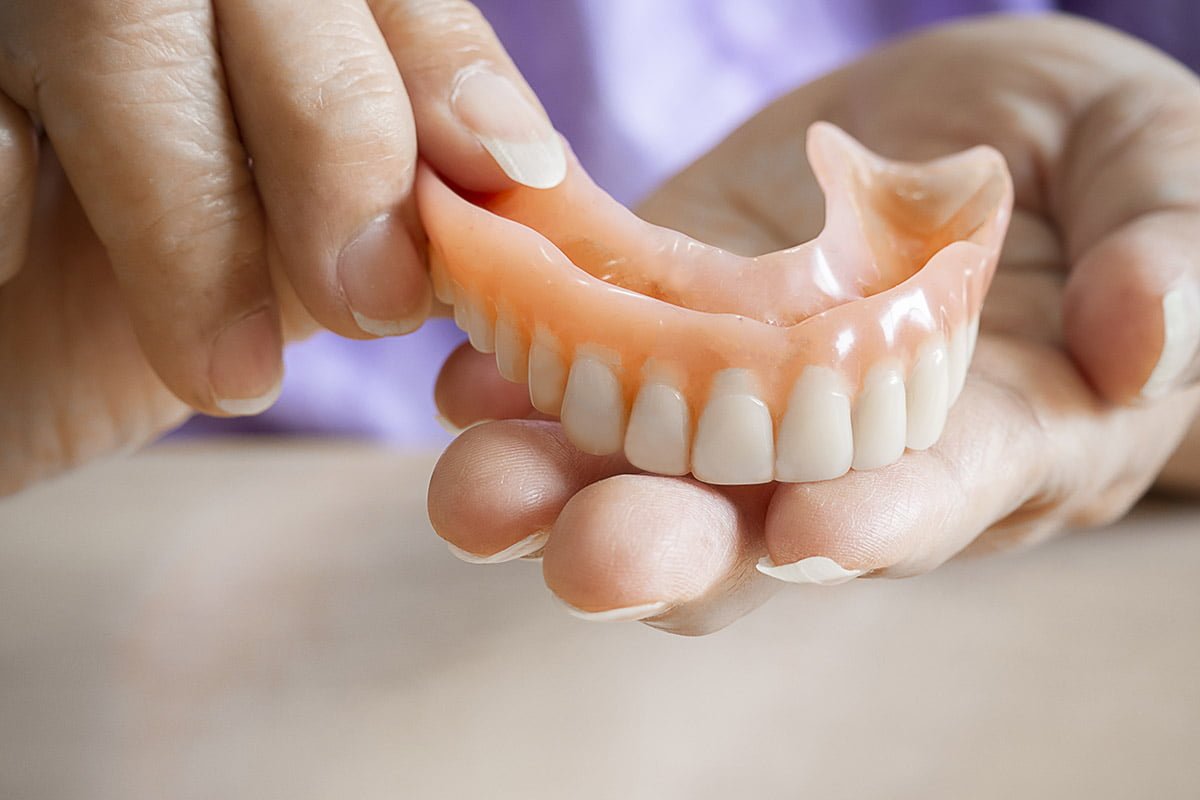 A complete set of dentures, designed to replace missing teeth and restore function and appearance.